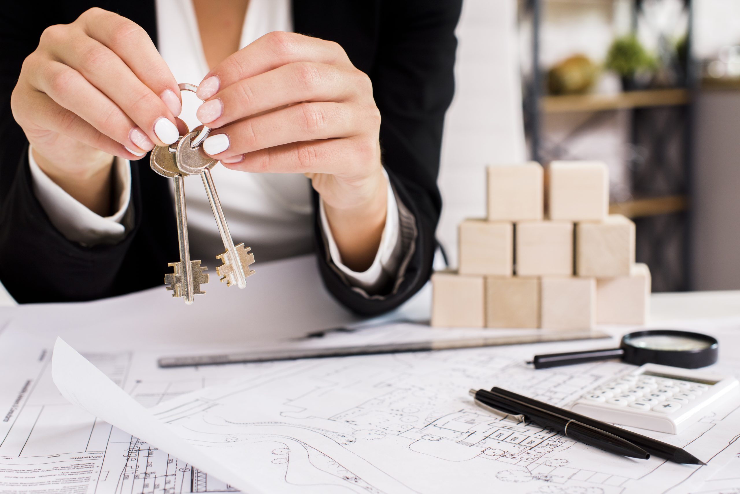 woman-showing-set-keys